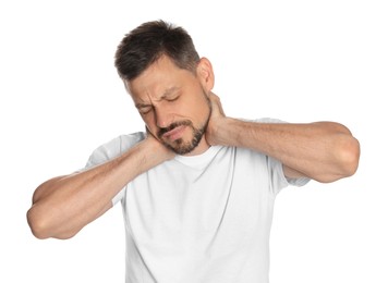 Photo of Man suffering from neck pain on white background