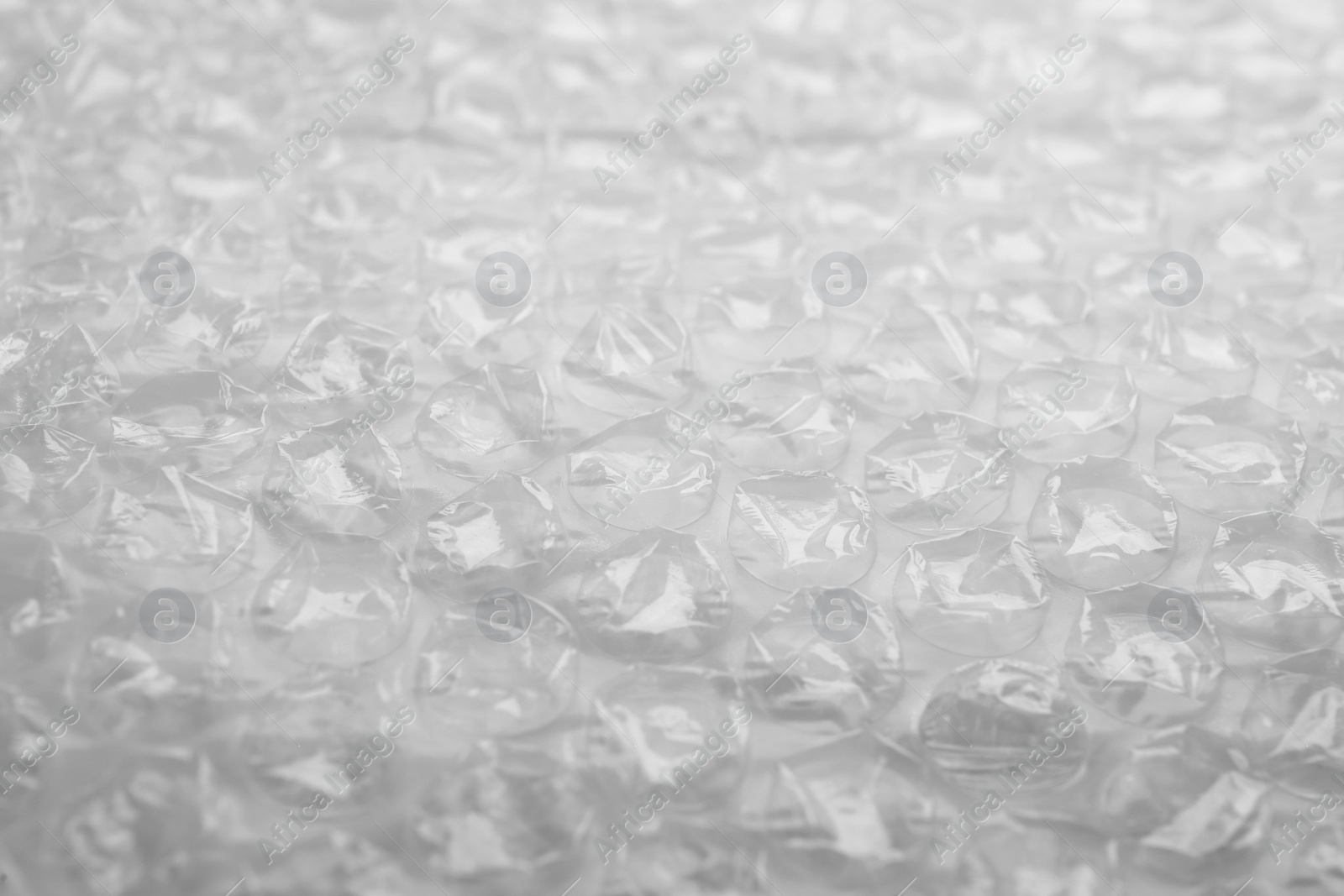 Photo of Texture of bubble wrap as background, closeup