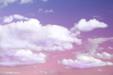 Image of Magic sky with fluffy clouds toned in pastel colors
