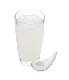 Photo of Glass of coconut water, ice cubes and nut isolated on white