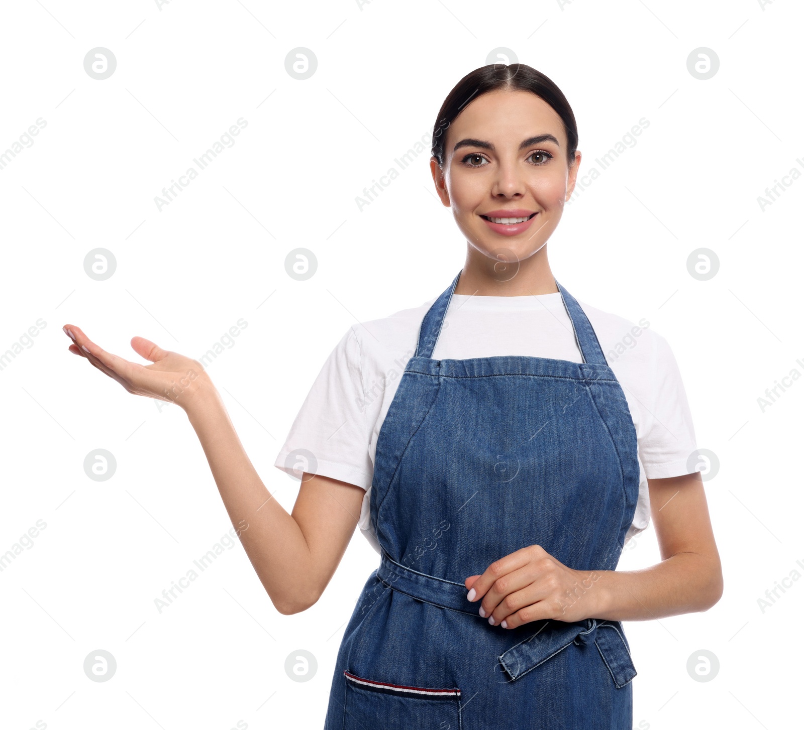 Photo of Young woman in blue jeans apron on white background