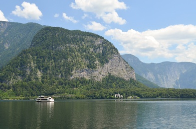 Picturesque view of river and mountains on sunny day