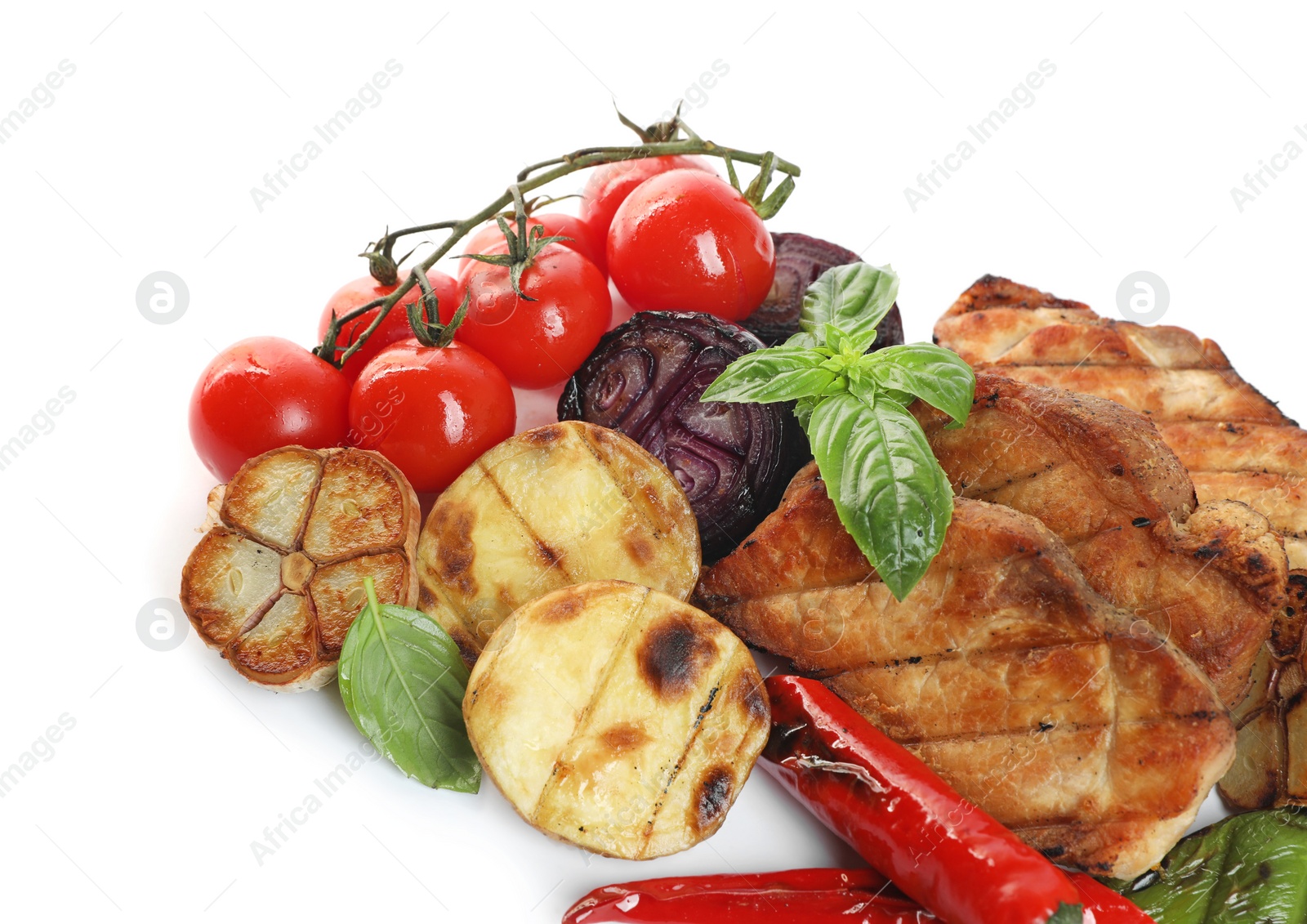 Photo of Tasty grilled vegetables, meat, fresh cherry tomatoes and basil isolated on white