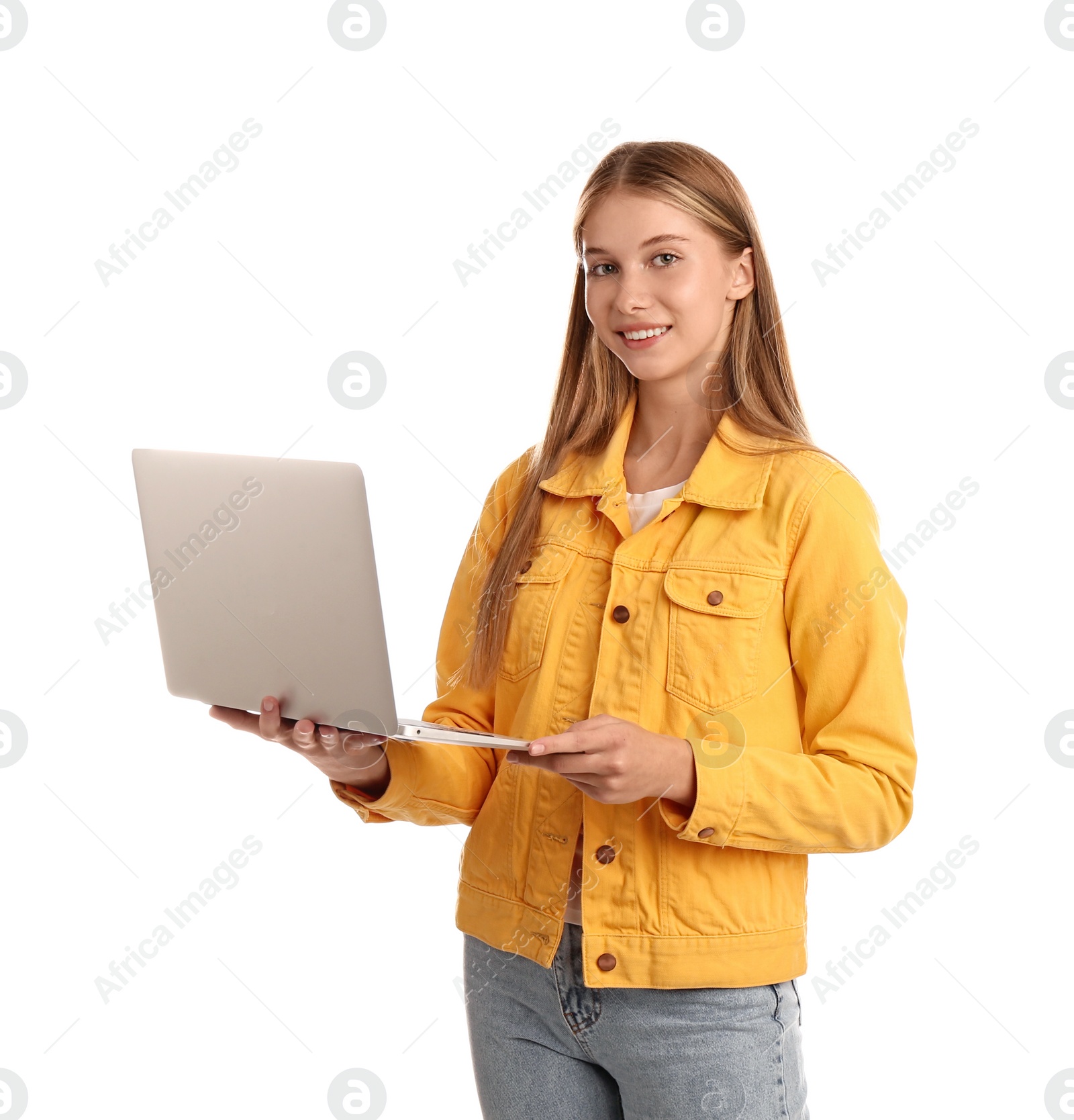 Photo of Teenage student using laptop on white background