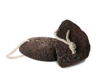 Image of Dark pumice stones on white background. Pedicure tool