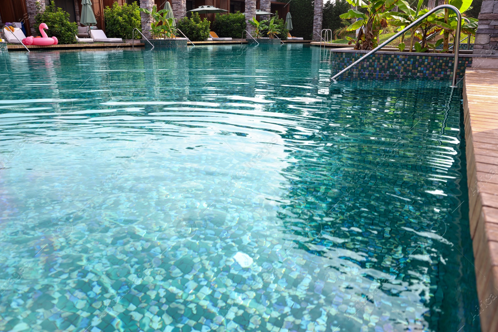 Photo of Clear water with ripples in outdoor swimming pool