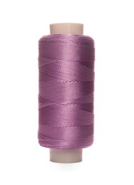 Spool of violet sewing thread isolated on white