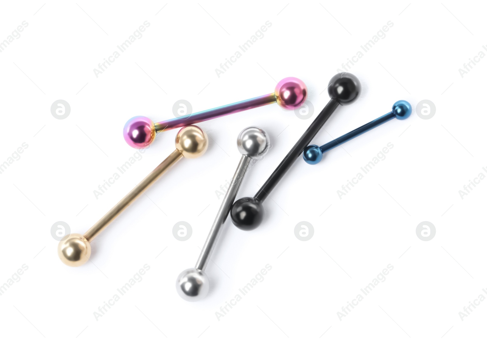 Photo of Piercing jewelry. Many different straight barbells on white background