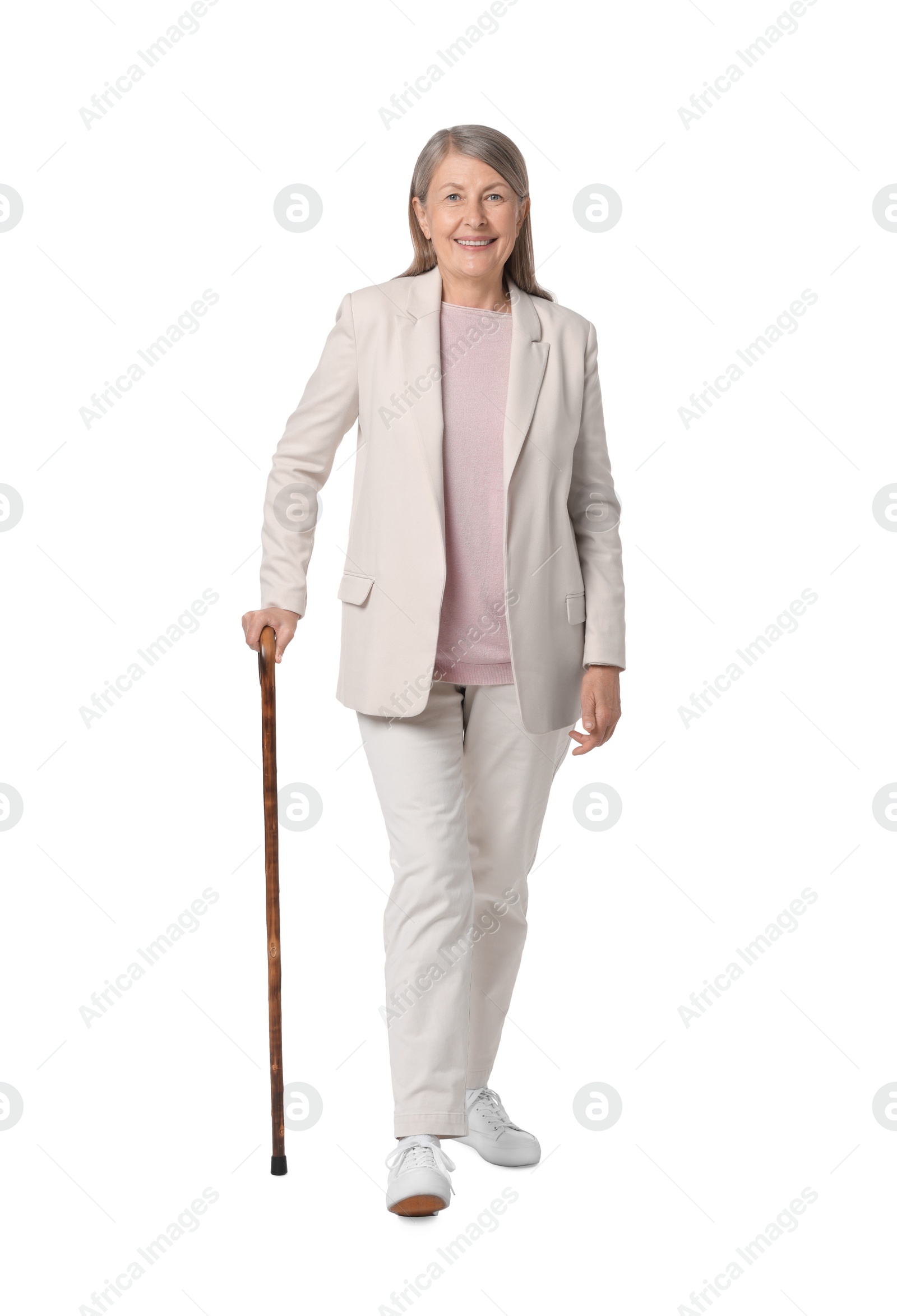 Photo of Senior woman with walking cane on white background