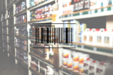 Image of Barcode and blurred view of modern wholesale warehouse