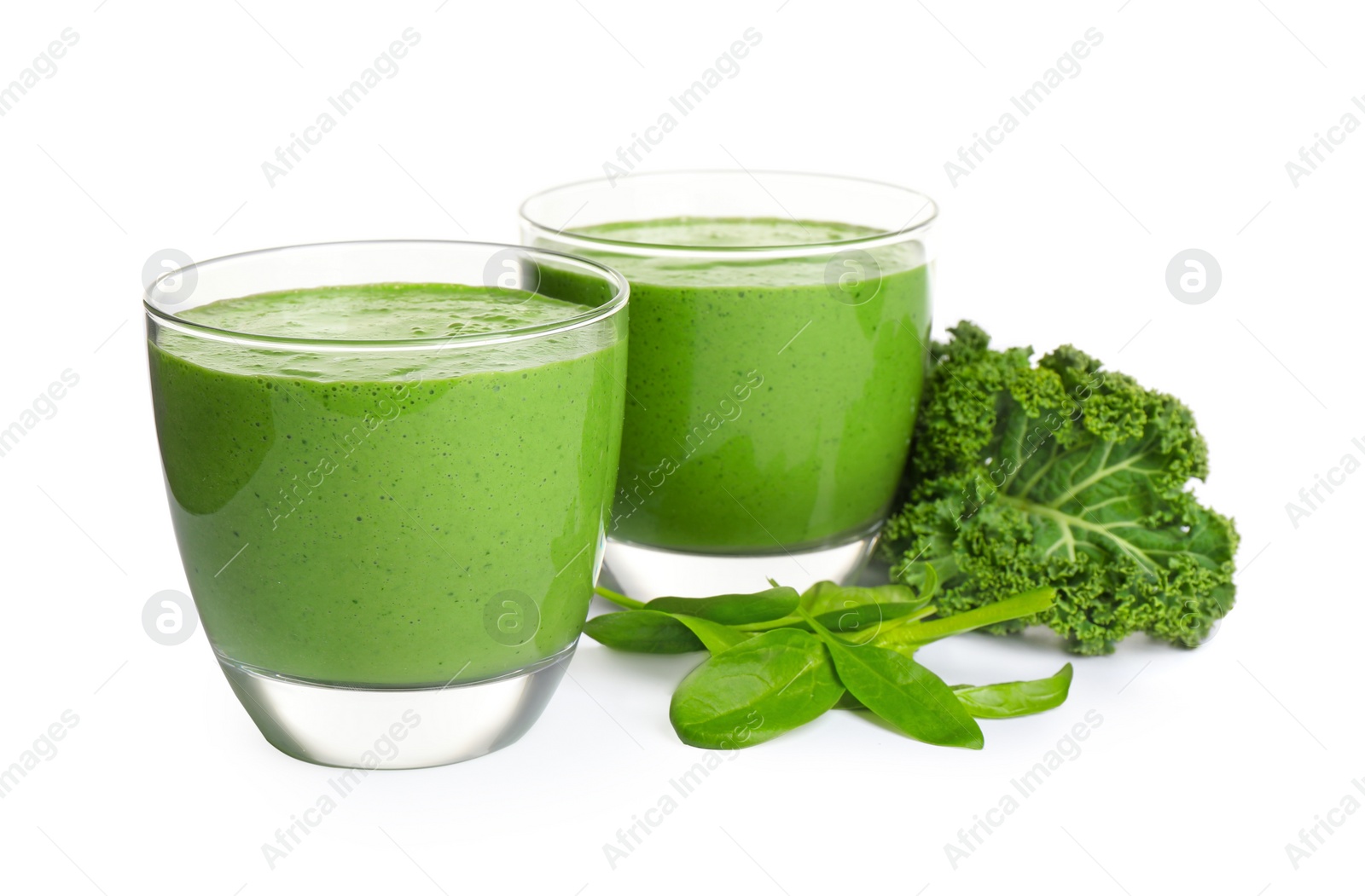 Photo of Tasty fresh kale smoothie with spinach isolated on white