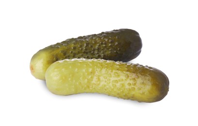 Photo of Tasty crunchy pickled cucumbers isolated on white