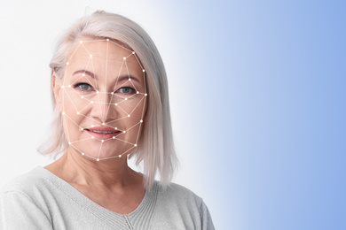 Image of Facial recognition system. Mature woman with biometric identification scanning grid on light background, space for text