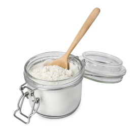 Baking powder in glass jar and spoon isolated on white