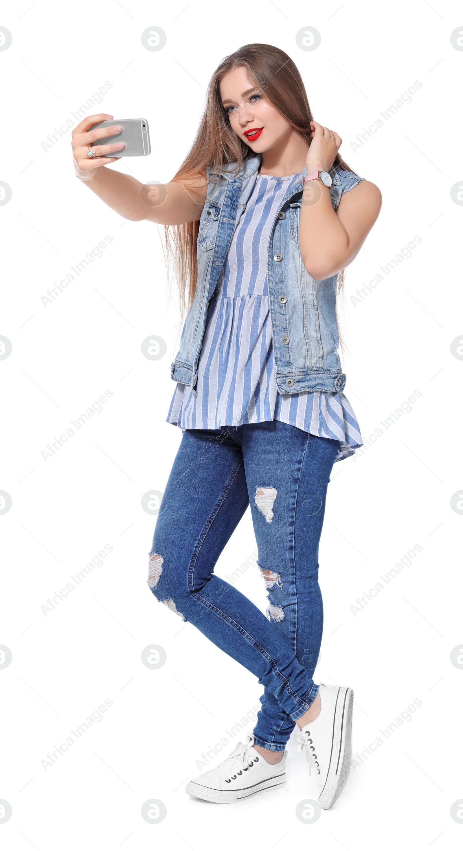 Photo of Attractive young woman taking selfie on white background