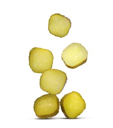 Image of Slices of tasty pickled cucumbers on white background