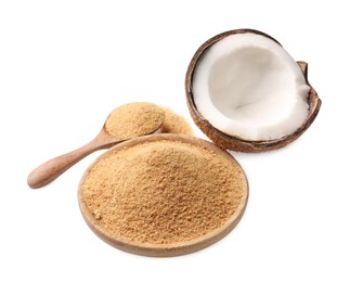 Photo of Coconut sugar in bowl, spoon and fruit isolated on white