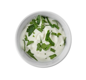 Bowl with sour cream and herbs on white background, top view