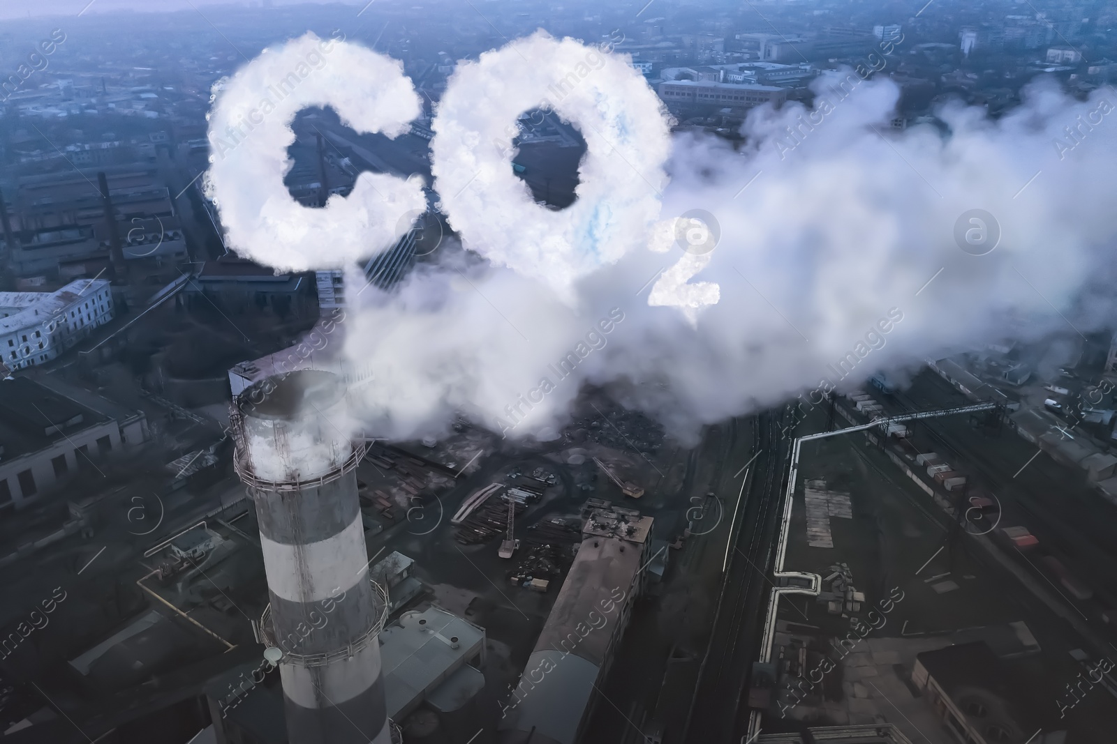 Image of Inscription CO2 made of smoke. Industrial factory polluting air, aerial view