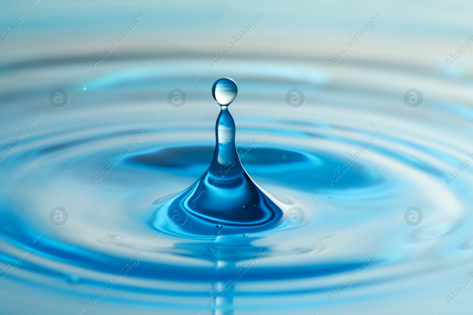 Photo of Splash of clear water with drops as background, closeup