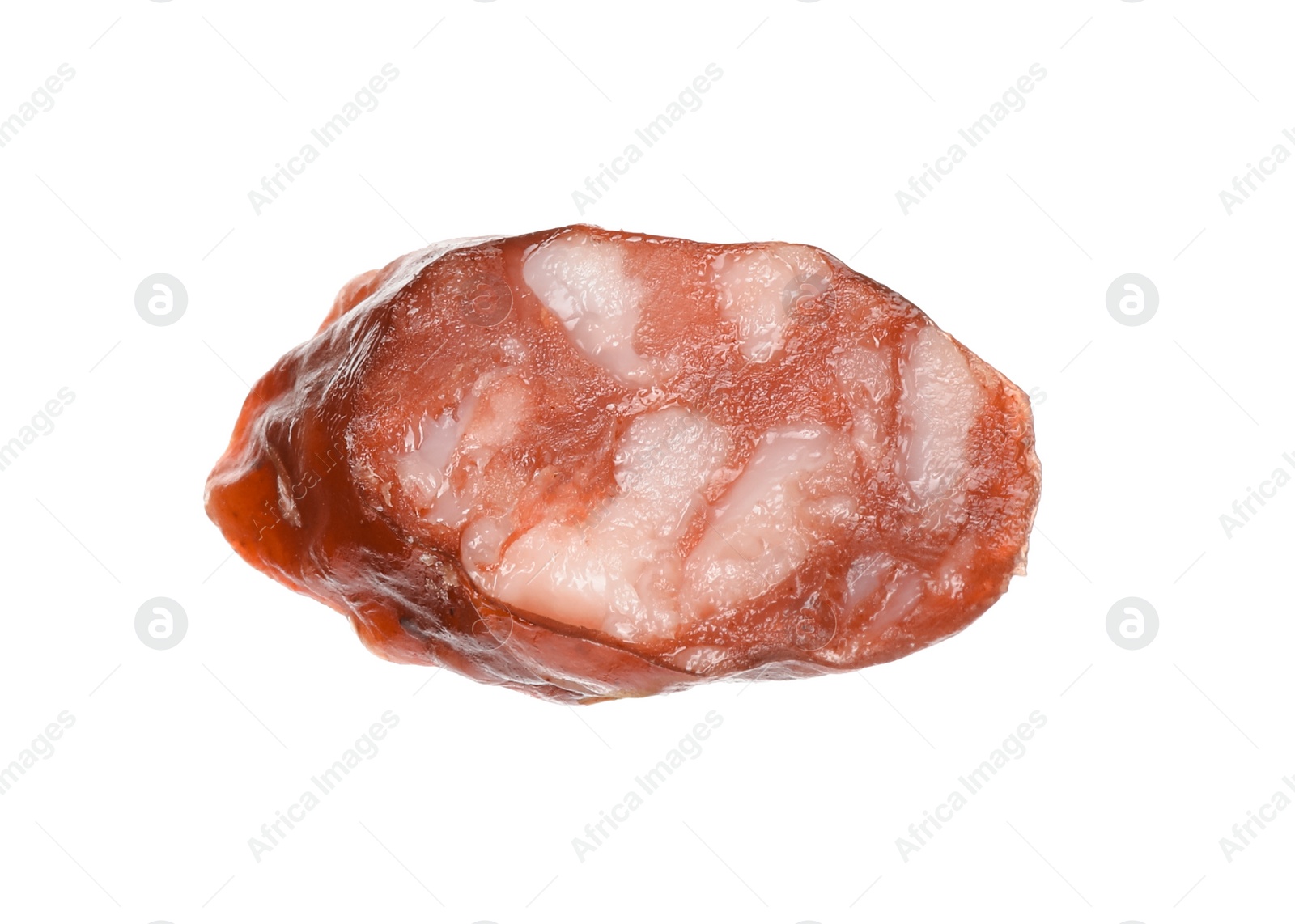 Photo of Piece of thin dry smoked sausage isolated on white