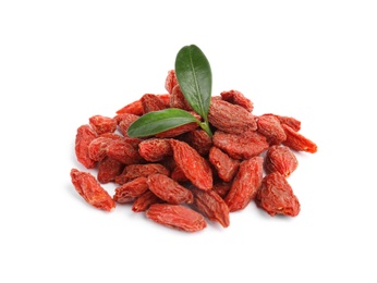 Pile of dried goji berries and leaves on white background