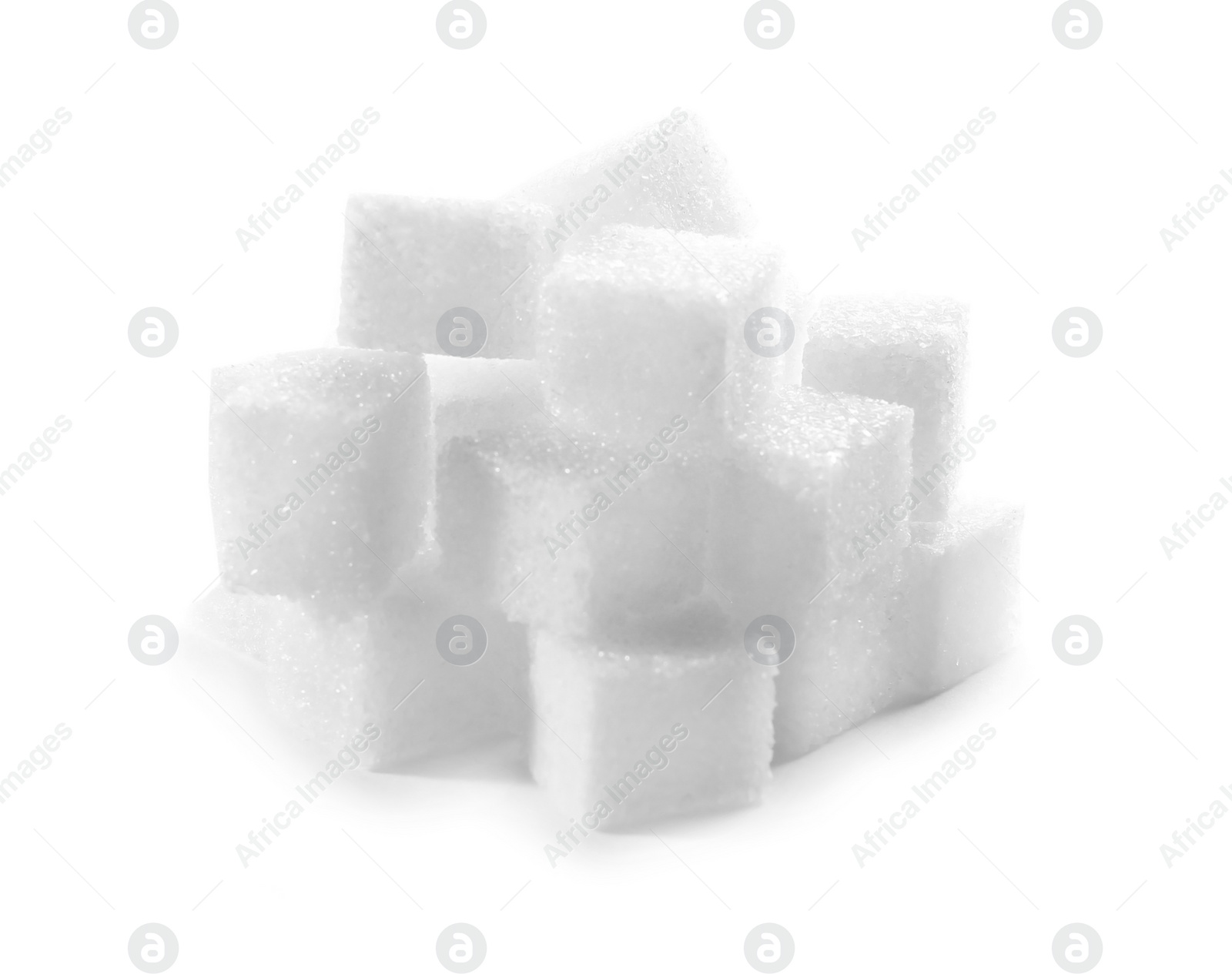 Photo of Pile of refined sugar cubes on white background