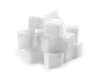 Photo of Pile of refined sugar cubes on white background