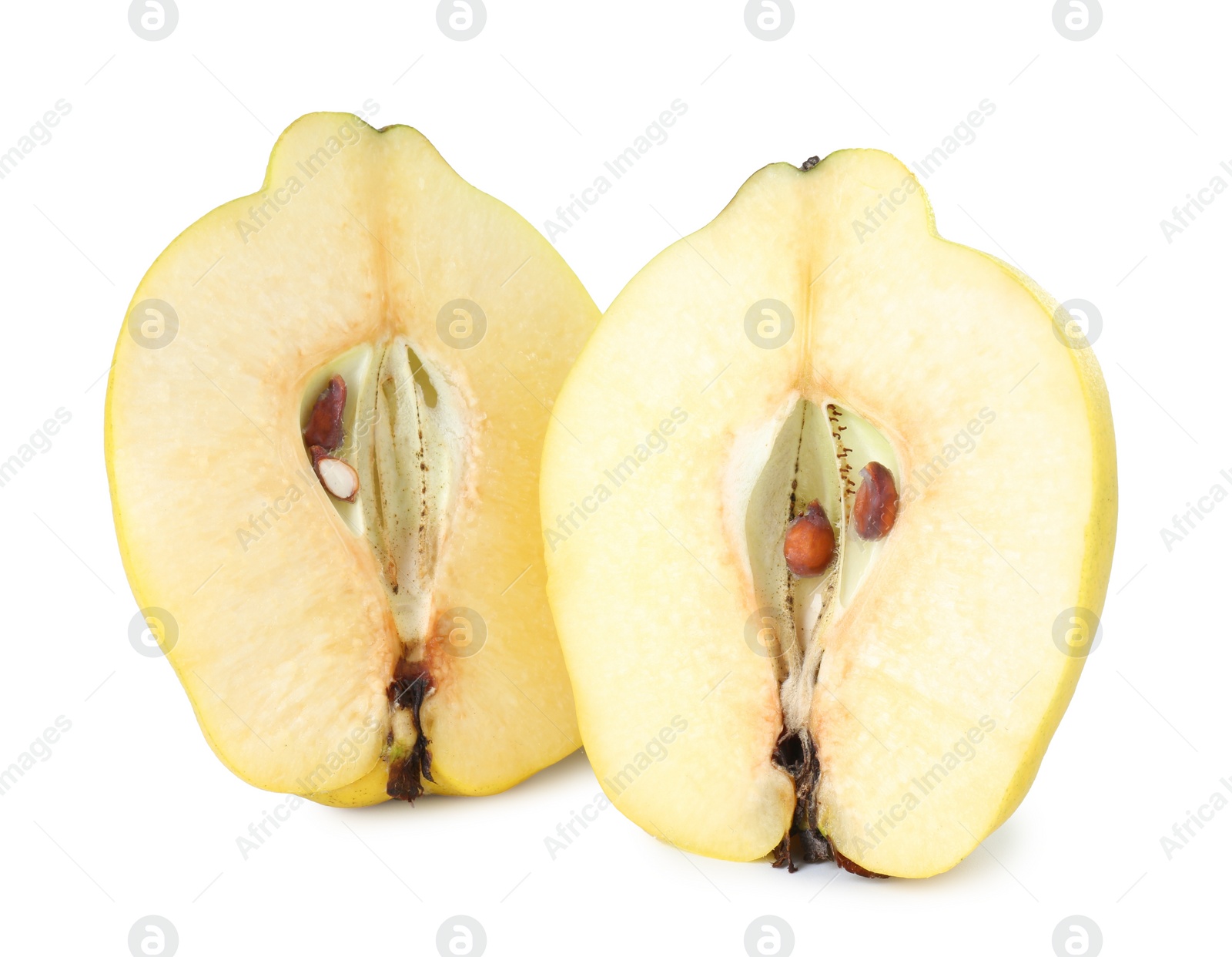 Photo of Halves of fresh ripe quince isolated on white