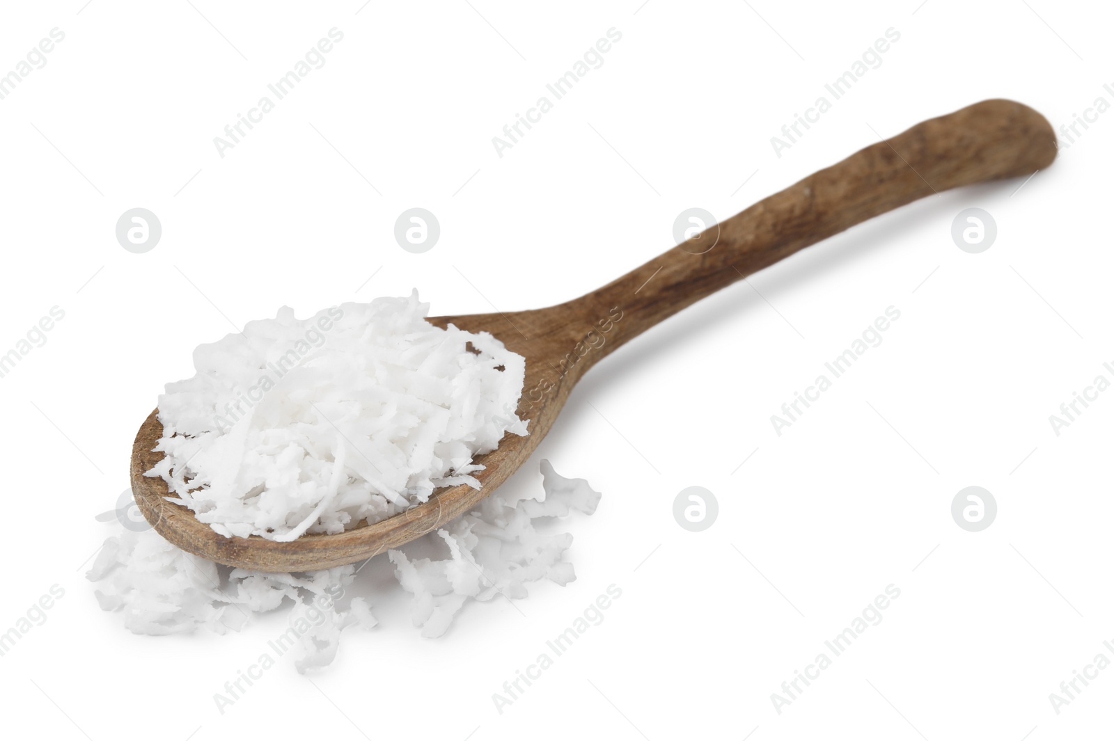 Photo of Coconut flakes in wooden spoon isolated on white