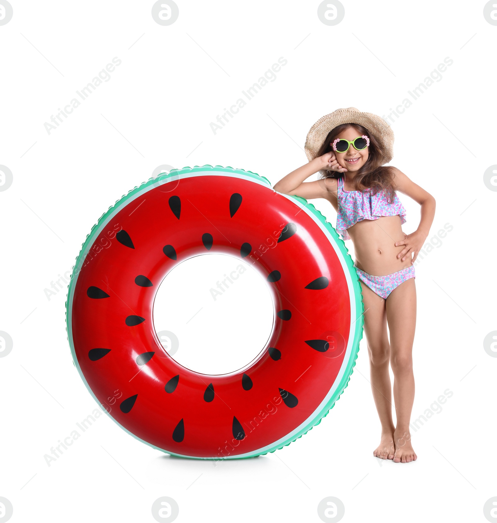 Photo of Cute little girl with inflatable ring on white background