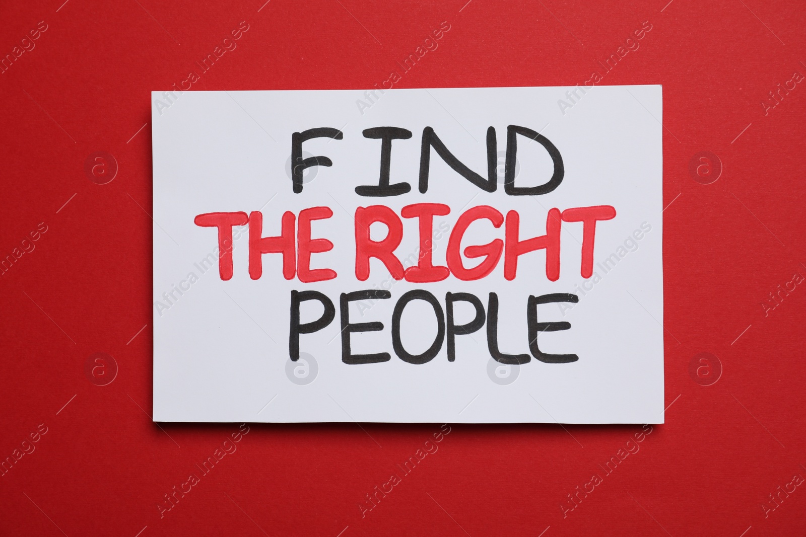 Photo of Card with motivational phrase Find The Right People on red background