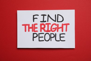 Photo of Card with motivational phrase Find The Right People on red background