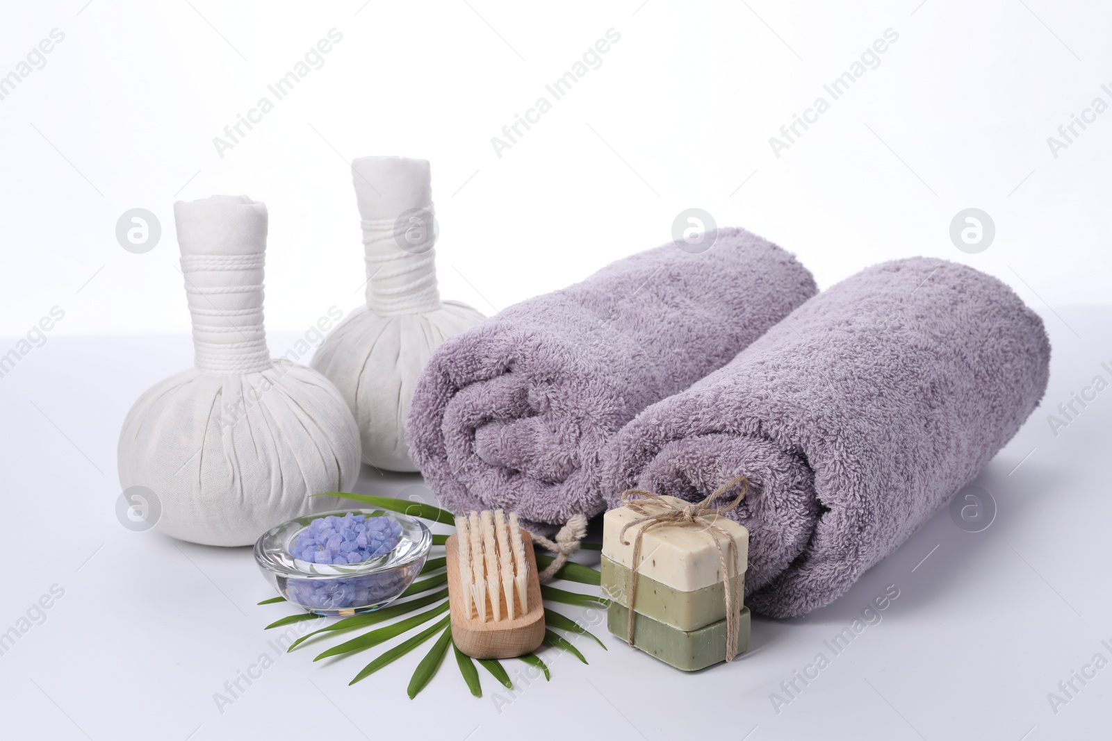 Photo of Different spa supplies and floral decor isolated on white