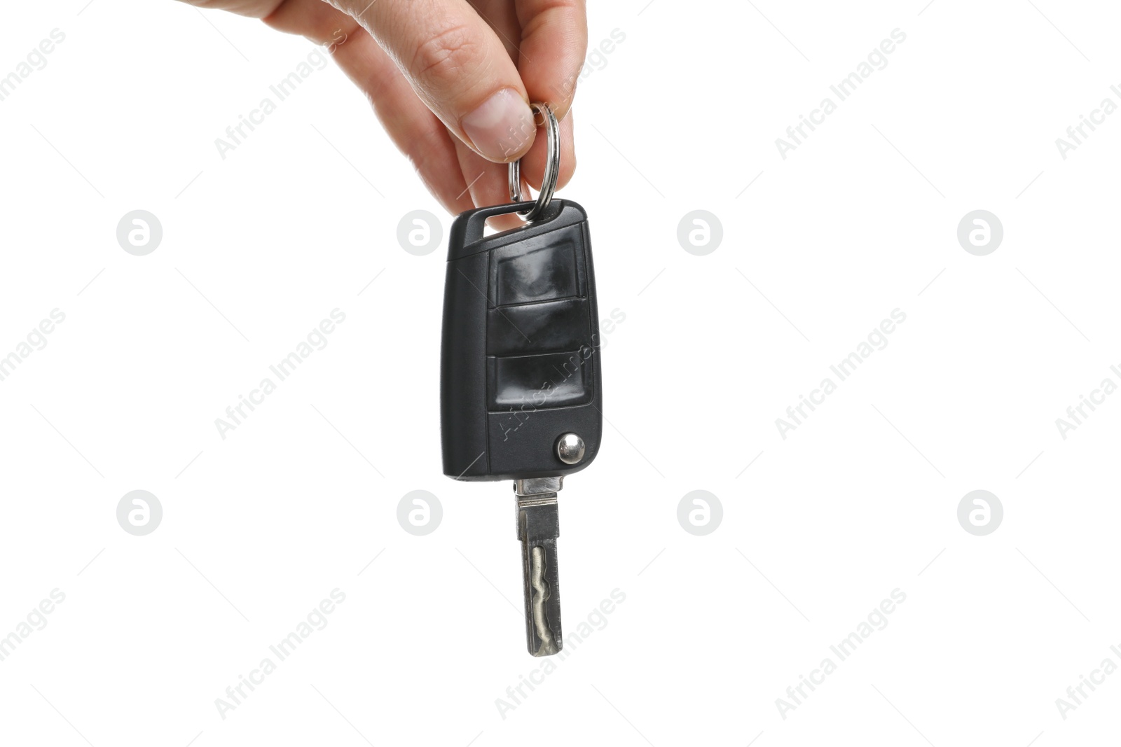 Photo of Man holding key on white background, closeup. Car buying