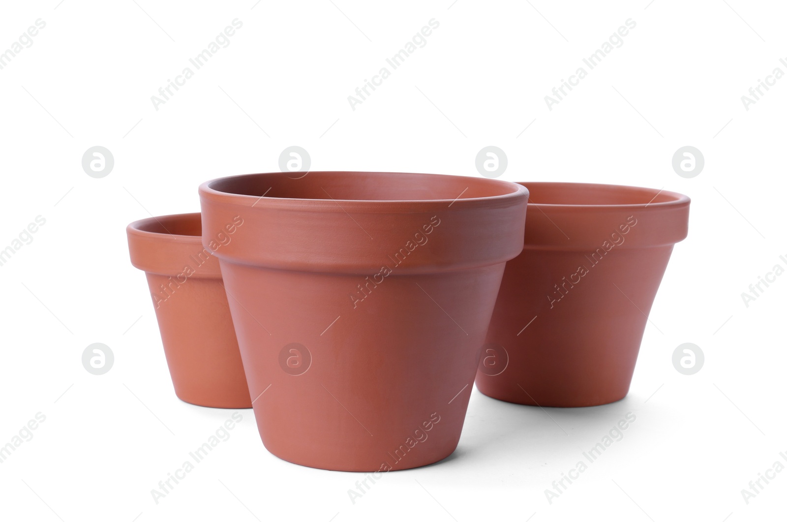 Photo of Stylish terracotta flower pots isolated on white