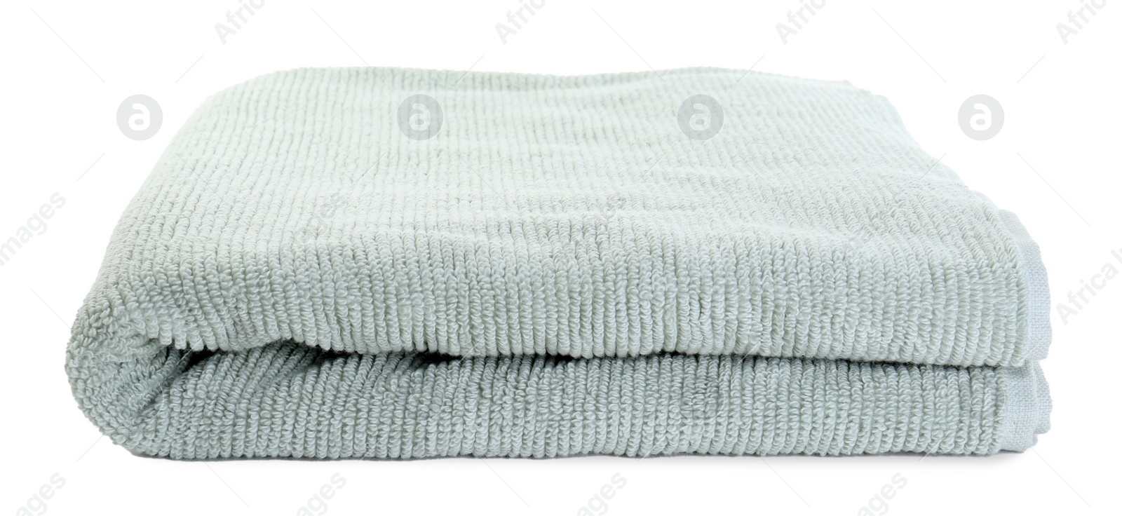 Photo of One soft folded towel isolated on white