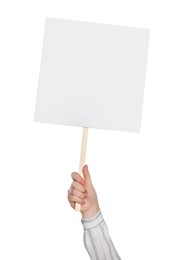 Woman holding blank protest sign on white background, closeup