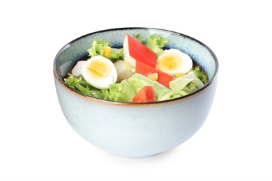 Photo of Delicious salad with crab sticks and eggs in ceramic bowl on white background