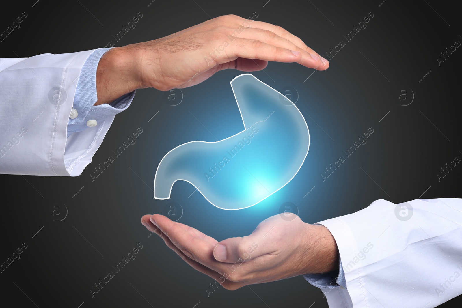 Image of Symptoms and treatment of heartburn and other gastrointestinal diseases. Doctor holding stomach illustration on black background, closeup