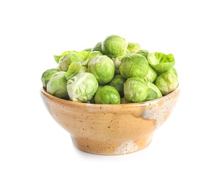 Photo of Bowl of fresh Brussels sprouts isolated on white