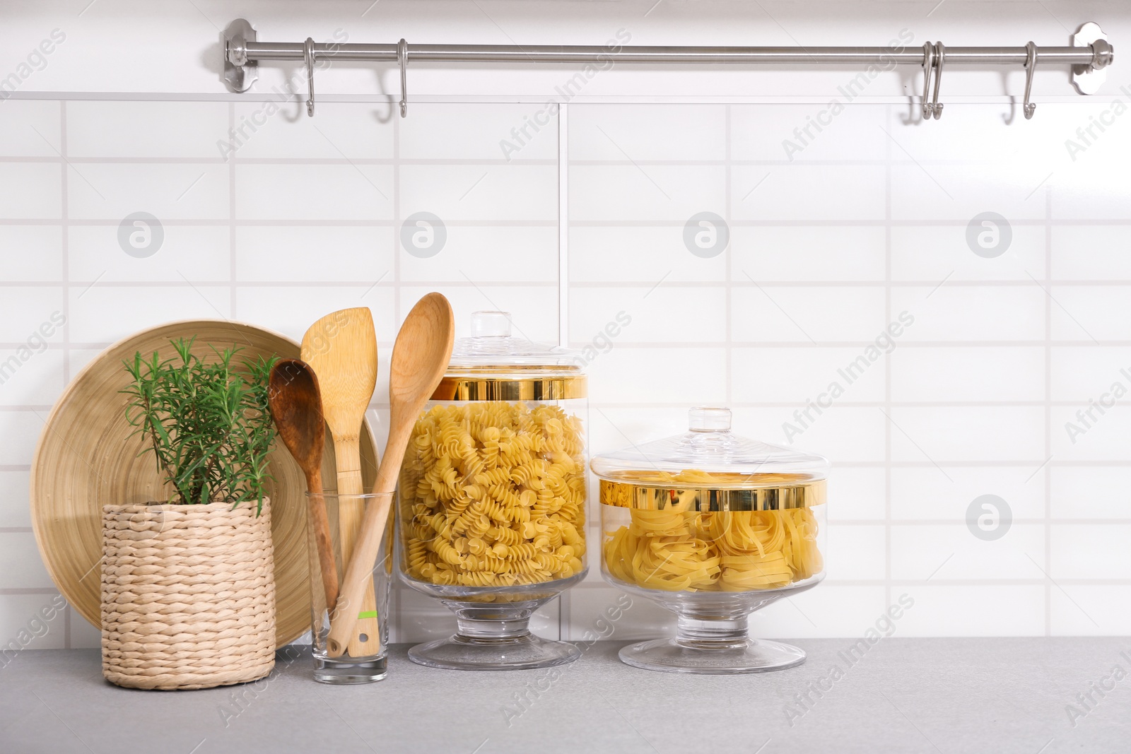 Photo of Products and modern kitchen utensils on table