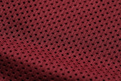 Photo of Texture of burgundy fabric as background, closeup