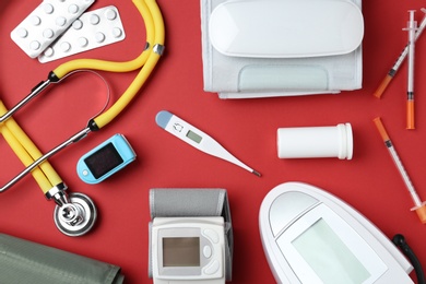 Photo of Flat lay composition with different medical objects on color background