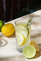 Summer refreshing lemonade and ingredients on light table