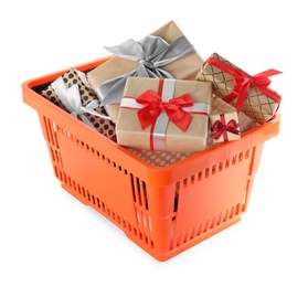 Orange shopping basket with different gifts on white background