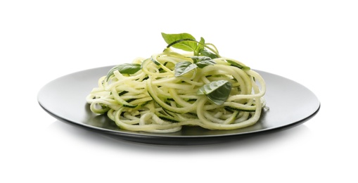 Delicious fresh zucchini pasta with basil on white background