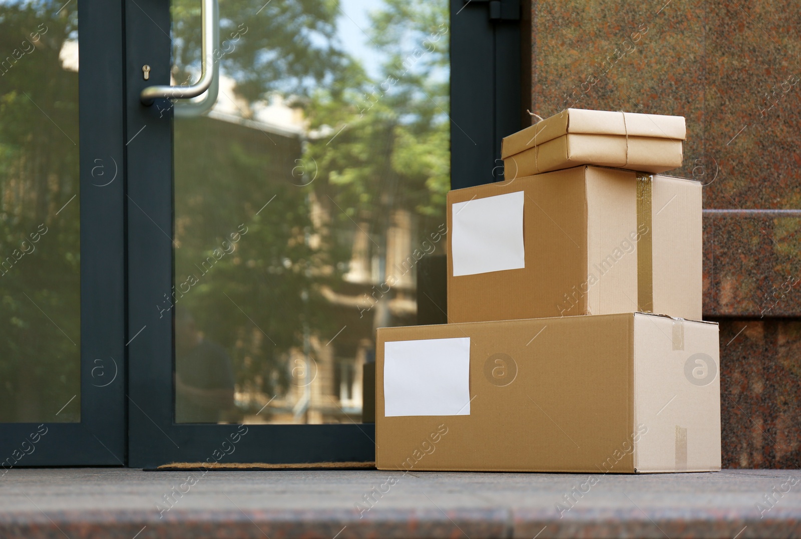 Photo of Delivered parcels on porch near front door