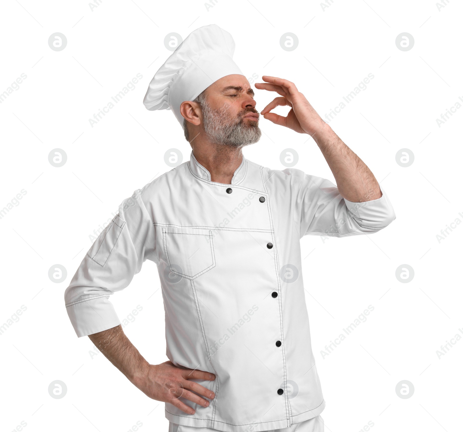 Photo of Chef in uniform showing perfect sign on white background