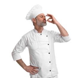 Photo of Chef in uniform showing perfect sign on white background